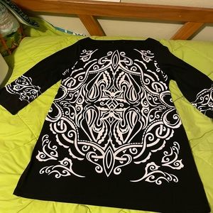 Classy ladies top.  Long.  Great with leggings.